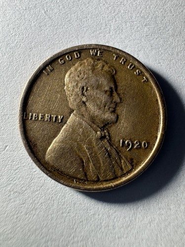 Close-up of the 1920-S wheat penny repunched mint mark showing the S/S North variety with secondary S impression visible above the primary S
